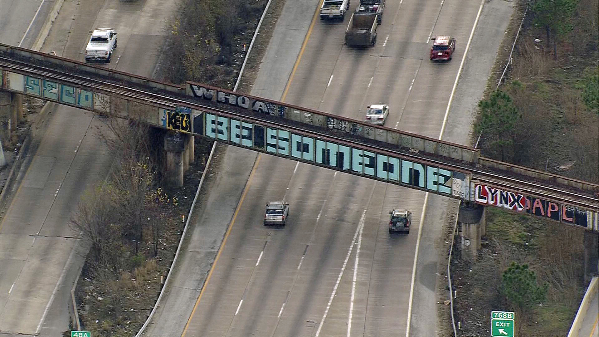 Is 'Be Someone' bridge graffiti or a landmark? Thousands